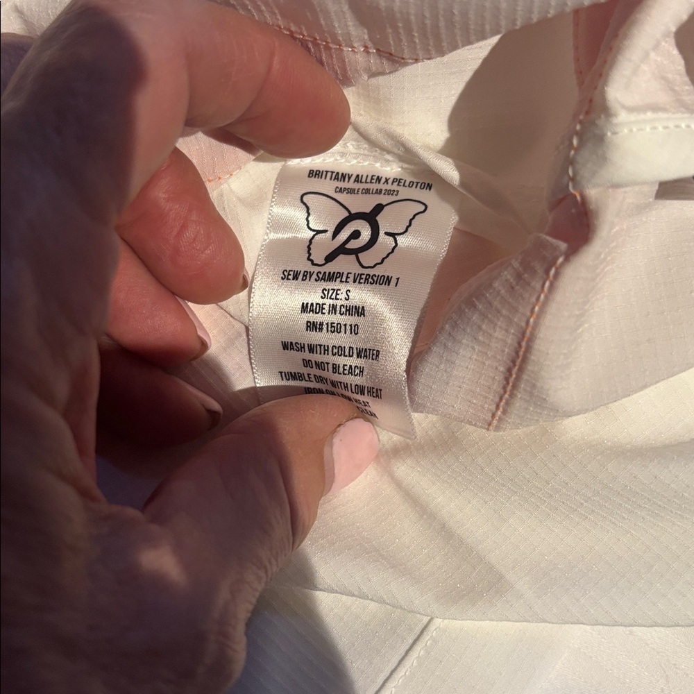 PELOTON CARGO JACKET NWTS WHITE ORANGE FUCHIA ZIP CLOSURE DRAW STRING GOLD TABS - Picture 11 of 11